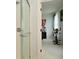 A look from a bathroom to a bedroom with a stationary bike at 2330 Oak Dr, Clayton, IN 46118