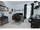 Bright bedroom with a desk, shelves, and a guitar at 2330 Oak Dr, Clayton, IN 46118