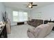 Comfortable living room with neutral tones, large windows, and a relaxing atmosphere at 2330 Oak Dr, Clayton, IN 46118