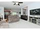 Inviting living room open to the kitchen with ample seating and natural light at 2330 Oak Dr, Clayton, IN 46118