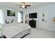 Spacious main bedroom with ceiling fan and adjoining bathroom at 2330 Oak Dr, Clayton, IN 46118