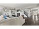 A bright living room with hardwood floors and fireplace at 2447 Stonehaven Dr, Avon, IN 46123