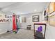 Functional workout room equipped with punching bag, weights, and treadmill at 2447 Stonehaven Dr, Avon, IN 46123