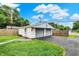 This two-car garage features a paved driveway, ample parking space, and a well-manicured lawn, adding convenience and curb appeal at 2538 Sickle Rd, Indianapolis, IN 46219