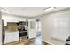 Modern kitchen features white cabinets, stainless steel appliances, and stylish backsplash at 2538 Sickle Rd, Indianapolis, IN 46219