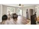 Inviting living area boasts sleek floors and a view of the front door and stainless steel refrigerator at 2538 Sickle Rd, Indianapolis, IN 46219