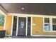 Charming covered porch with newly painted address and exterior lighting at 2936 Guilford Ave, Indianapolis, IN 46205