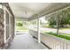 Open-air porch featuring stone accents and white railing, offering a pleasant view of the neighborhood at 315 Schoolhouse Rd, Franklin, IN 46131