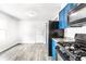 Bright eat-in kitchen with stainless steel refrigerator and laminate flooring at 315 Schoolhouse Rd, Franklin, IN 46131