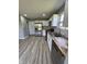 Kitchen features stainless steel appliances, white cabinets, and butcher block countertop at 3327 Brandenburg Blvd, Indianapolis, IN 46239