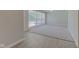 Bright living room with large windows and new carpet, offering a comfortable living space at 3339 Devereaux Dr, Indianapolis, IN 46228
