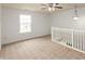 Upstairs landing area features carpet at 3623 Carroll Farms Dr, Indianapolis, IN 46235