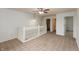 Upstairs landing area features carpet, and access to bedrooms at 3623 Carroll Farms Dr, Indianapolis, IN 46235
