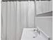 This bathroom features updated sink and shower curtain at 3627 N Brentwood Ave, Indianapolis, IN 46235