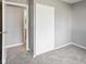 This bedroom features soft carpet and a closet at 3627 N Brentwood Ave, Indianapolis, IN 46235