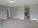 Living room featuring gray walls and light wood floors at 3627 N Brentwood Ave, Indianapolis, IN 46235