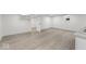 Finished basement with modern flooring, freshly painted with granite countertop kitchen at 3716 W 16Th St, Indianapolis, IN 46222