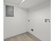 Basement utility area with washer hookup and electric panel at 3716 W 16Th St, Indianapolis, IN 46222