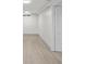Spacious basement with an open door and a small window with blinds at 3716 W 16Th St, Indianapolis, IN 46222