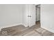 Well lit room featuring modern flooring and a freshly painted clean, neutral color palette and doors at 3716 W 16Th St, Indianapolis, IN 46222