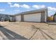 Two car garage with paved driveway at 3716 W 16Th St, Indianapolis, IN 46222