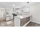 Bright kitchen with stainless steel appliances, granite countertops, and modern cabinets and breakfast bar at 3716 W 16Th St, Indianapolis, IN 46222