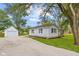 Charming home with detached garage and gravel driveway at 425 Patterson Rd, Columbus, IN 47203