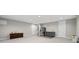 Finished basement with a wet bar, refrigerator, carpeted floors, and recessed lighting at 4359 Prairie Falcon Dr, Zionsville, IN 46077
