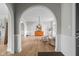 Bright living room with hardwood floors, archway, and neutral decor at 4359 Prairie Falcon Dr, Zionsville, IN 46077