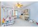bedroom featuring carpet floor, a ceiling fan, a window and an ample amount of decoration at 4399 Summerhaven Dr, New Palestine, IN 46163