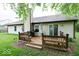 Backyard deck area with a grill, table and chairs, perfect for outdoor dining at 444 Austin Dr, Avon, IN 46123