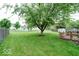 Spacious backyard featuring a wooden deck area and a shed at 444 Austin Dr, Avon, IN 46123