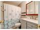 Bathroom featuring a modern vanity with storage, a decorative mirror, and a shower at 444 Austin Dr, Avon, IN 46123