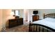 Comfortable bedroom with wooden furniture set and a window with plenty of sunlight at 444 Austin Dr, Avon, IN 46123