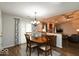 Cozy dining area with stylish chandelier, wood table, and lots of natural light at 444 Austin Dr, Avon, IN 46123