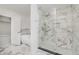Elegant bathroom featuring walk-in shower with glass door and rain shower head, plus a jetted tub at 4477 Devon Lake Rd, Indianapolis, IN 46226