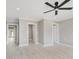 Spacious room with multiple entries and neutral color palette at 4477 Devon Lake Rd, Indianapolis, IN 46226
