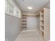 Walk-in closet with custom shelving at 4477 Devon Lake Rd, Indianapolis, IN 46226