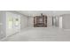 Sun-filled open-concept living room with fireplace and patio access at 4477 Devon Lake Rd, Indianapolis, IN 46226