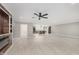 Open concept living room showing kitchen with eat in bar at 4477 Devon Lake Rd, Indianapolis, IN 46226
