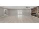 Spacious living room features recessed lighting, fireplace, and back patio access at 4477 Devon Lake Rd, Indianapolis, IN 46226