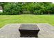 Shot of a backyard featuring a fire pit on a concrete patio at 4528 Hunt Master Ct, Indianapolis, IN 46268