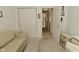 This is a bedroom featuring an open doorway with neutral toned furniture at 4528 Hunt Master Ct, Indianapolis, IN 46268