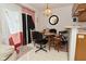 The dining area features a dining table and a sliding glass door to outside at 4528 Hunt Master Ct, Indianapolis, IN 46268