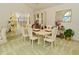 Sophisticated dining area with a formal table setting, chandelier, and elegant décor at 4528 Hunt Master Ct, Indianapolis, IN 46268