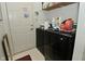 Practical laundry room with modern appliances and convenient storage solutions at 4528 Hunt Master Ct, Indianapolis, IN 46268