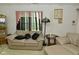 Relaxing living room with comfortable beige sofas and stylish accent pieces at 4528 Hunt Master Ct, Indianapolis, IN 46268