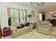 Comfortable living room featuring plush beige seating and decorative lighting at 4528 Hunt Master Ct, Indianapolis, IN 46268