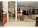 The living room features beige sofas, a fireplace, and a ceiling fan at 4528 Hunt Master Ct, Indianapolis, IN 46268