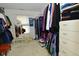 Organized walk-in closet featuring clothing racks and built-in storage shelves at 4528 Hunt Master Ct, Indianapolis, IN 46268